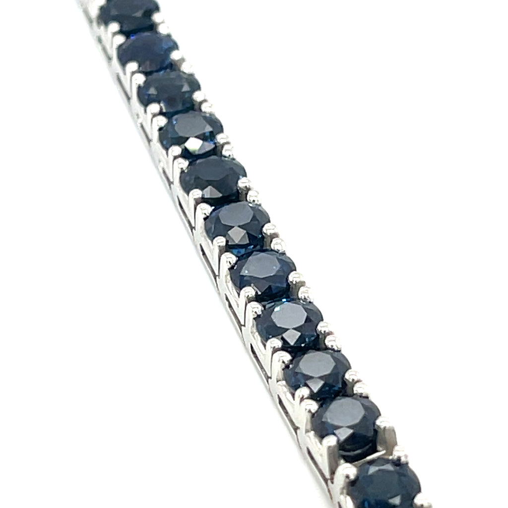 Platinum Tennis Bracelet With 21.50 ct Round Sapphires 7" Long