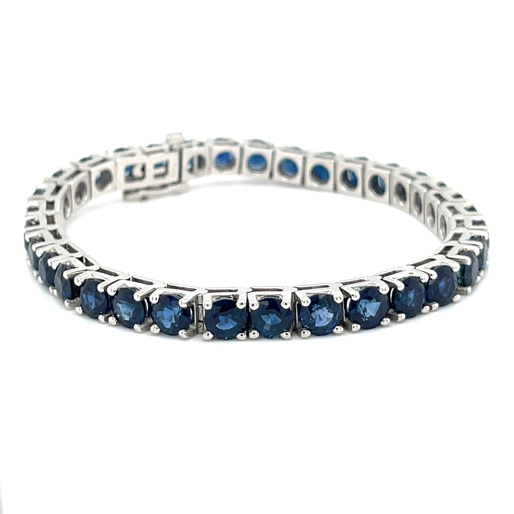 Platinum Tennis Bracelet With 21.50 ct Round Sapphires 7" Long