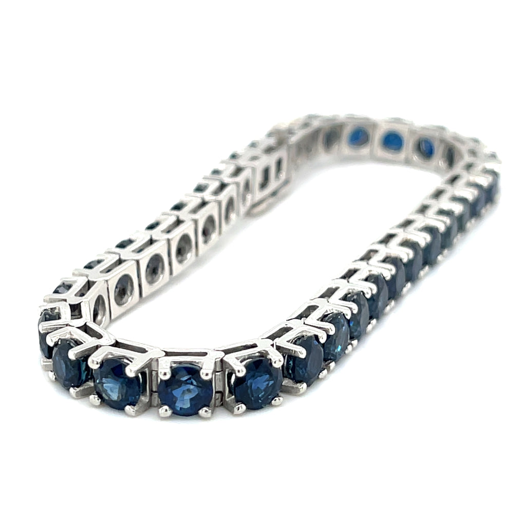Platinum Tennis Bracelet With 21.50 ct Round Sapphires 7" Long