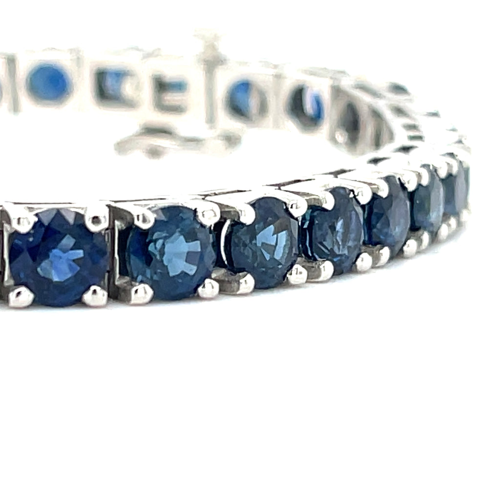 Platinum Tennis Bracelet With 21.50 ct Round Sapphires 7" Long