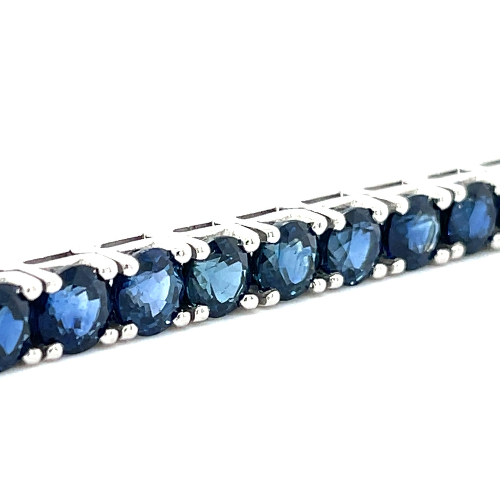 Platinum Tennis Bracelet With 21.50 ct Round Sapphires 7" Long