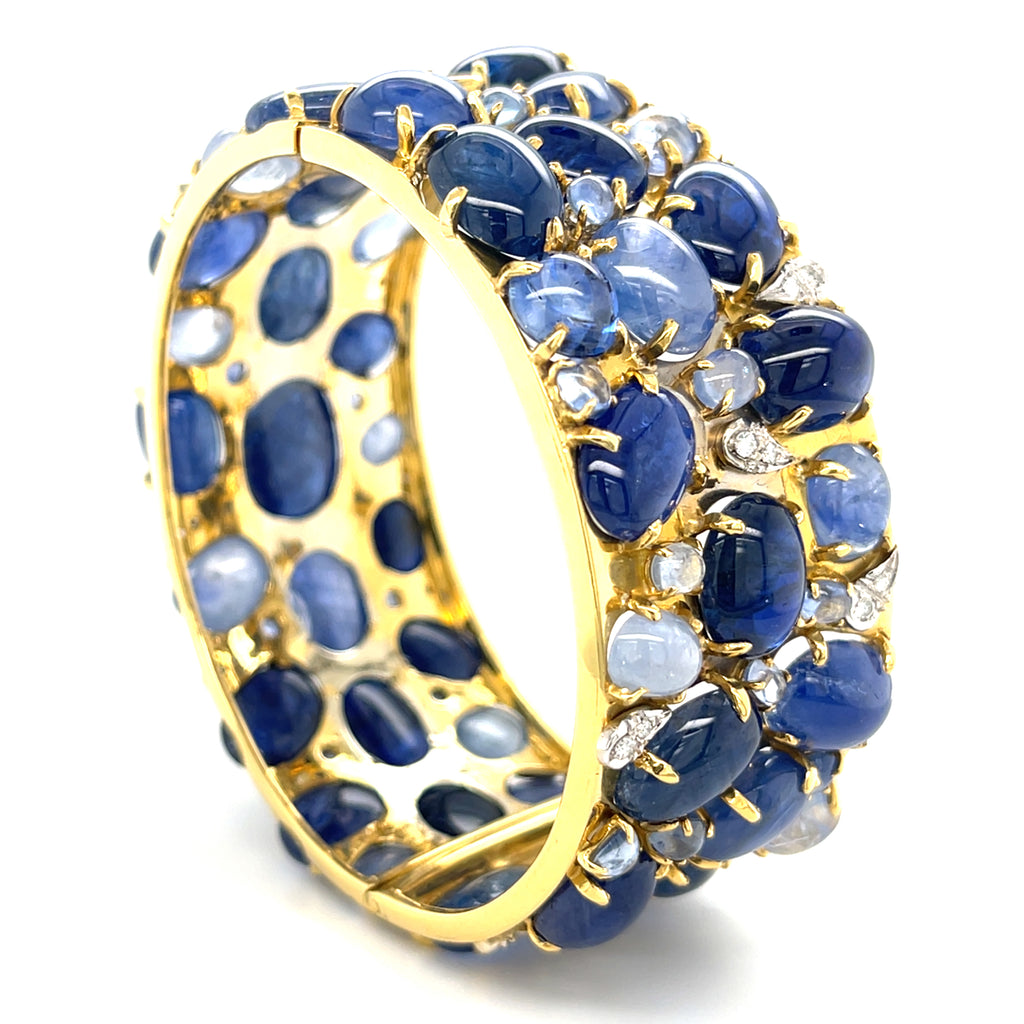 Oval-cut Sapphire Cabochon & Diamond Bangle set in 18k White and Yellow Gold