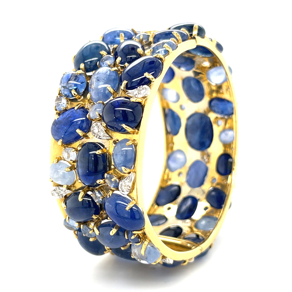 Oval-cut Sapphire Cabochon & Diamond Bangle set in 18k White and Yellow Gold