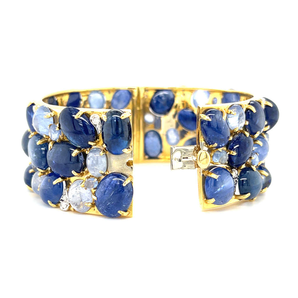 Oval-cut Sapphire Cabochon & Diamond Bangle set in 18k White and Yellow Gold