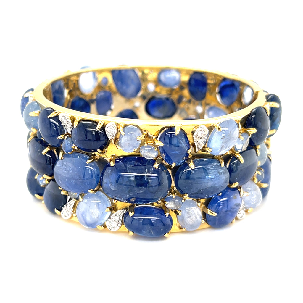 Oval-cut Sapphire Cabochon & Diamond Bangle set in 18k White and Yellow Gold