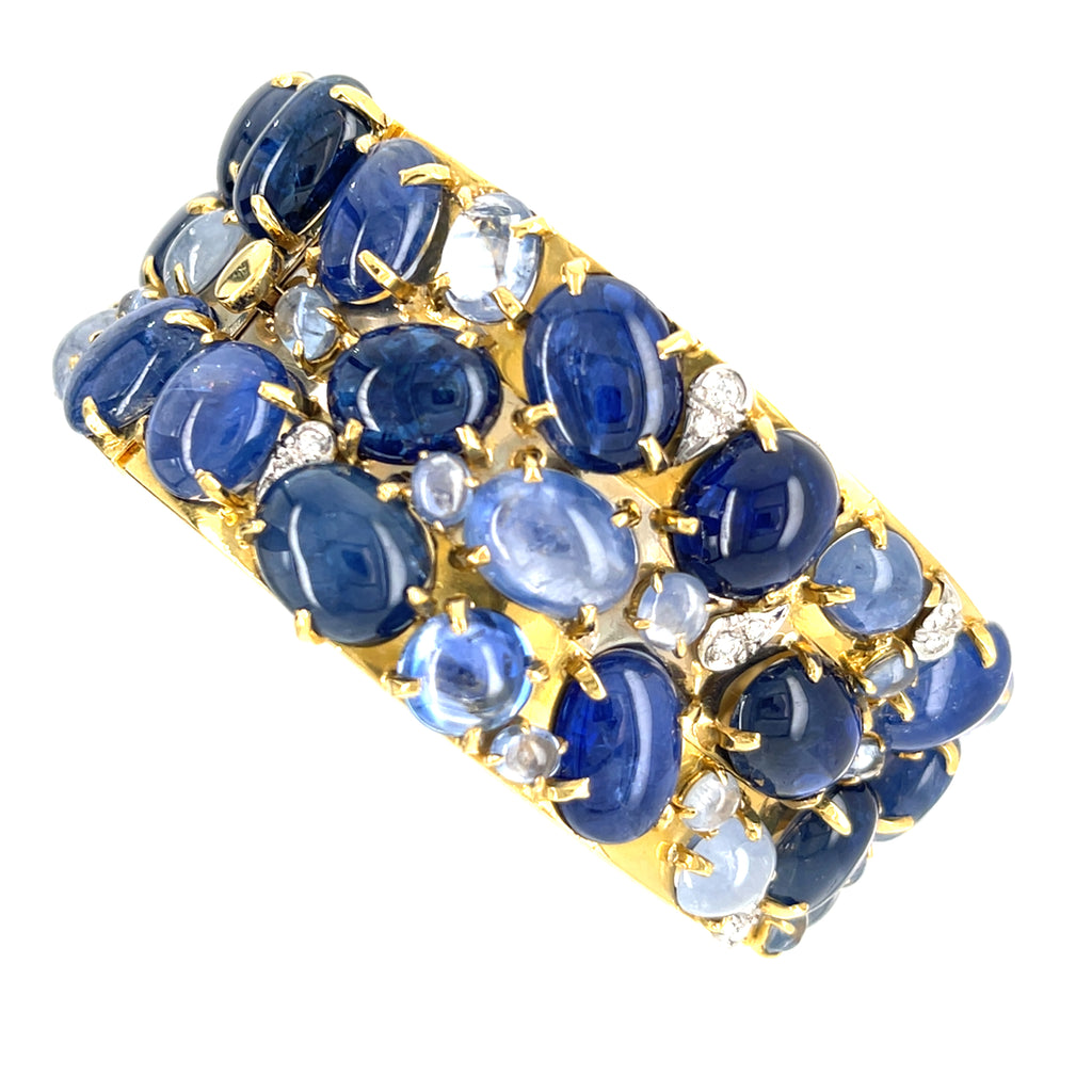 Oval-cut Sapphire Cabochon & Diamond Bangle set in 18k White and Yellow Gold