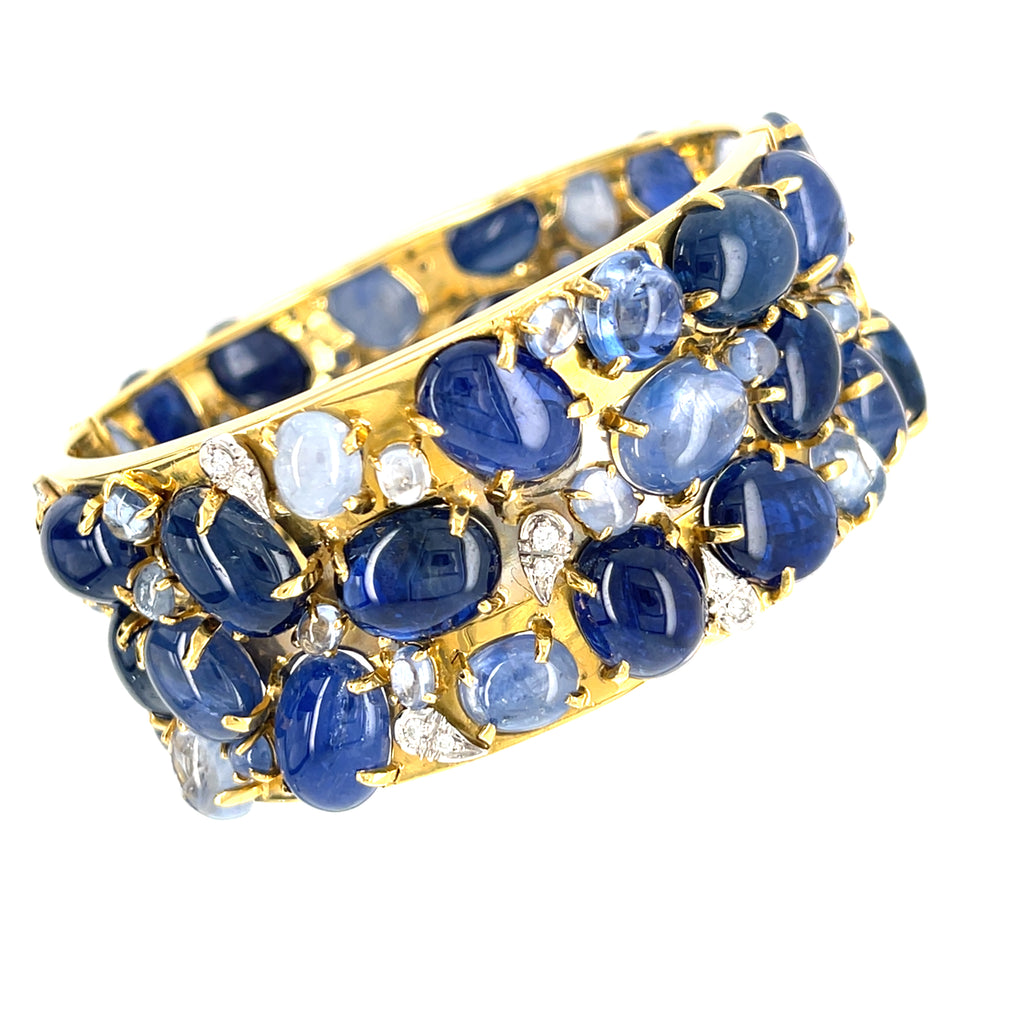 Oval-cut Sapphire Cabochon & Diamond Bangle set in 18k White and Yellow Gold