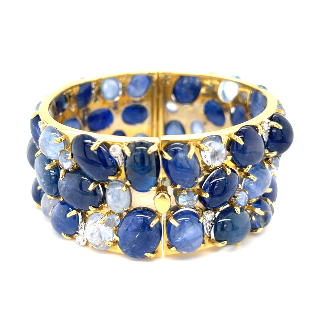 Oval-cut Sapphire Cabochon & Diamond Bangle set in 18k White and Yellow Gold
