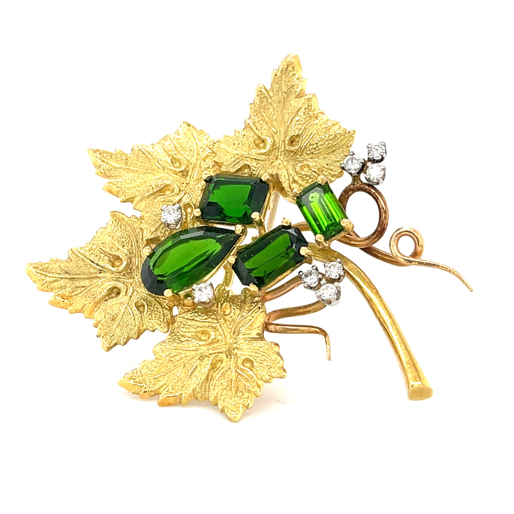18k Yellow Gold & Green Tourmaline Leaf Brooch w/ 0.24ct Diamond Accents.