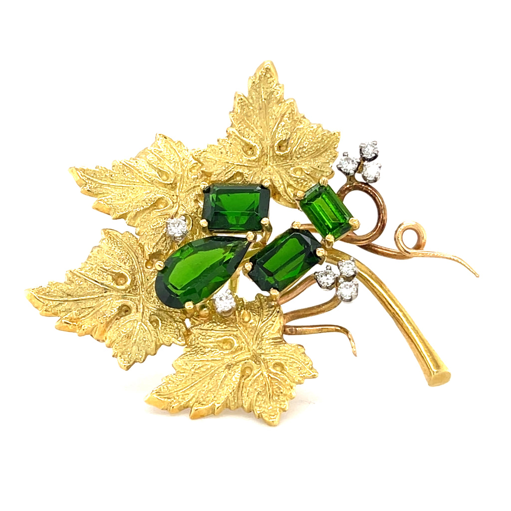 18k Yellow Gold & Green Tourmaline Leaf Brooch w/ 0.24ct Diamond Accents.