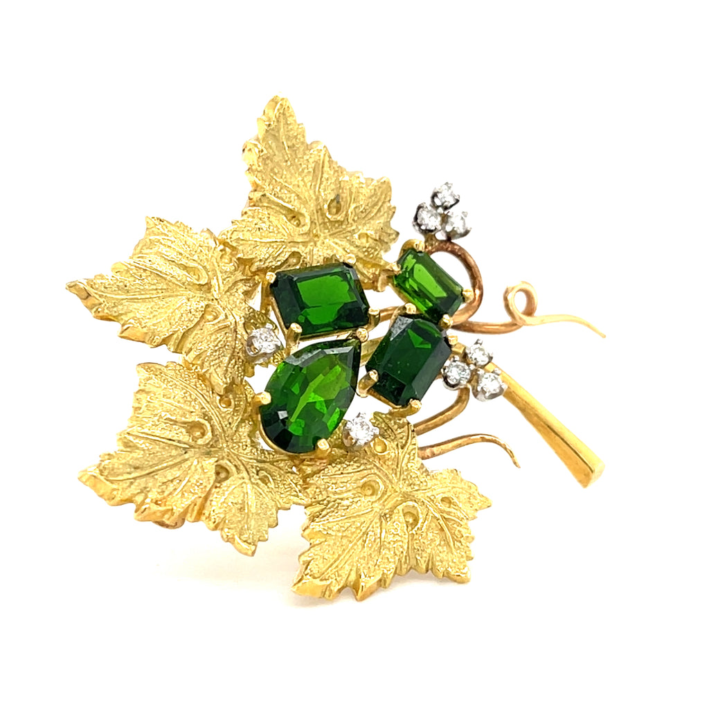 18k Yellow Gold & Green Tourmaline Leaf Brooch w/ 0.24ct Diamond Accents.