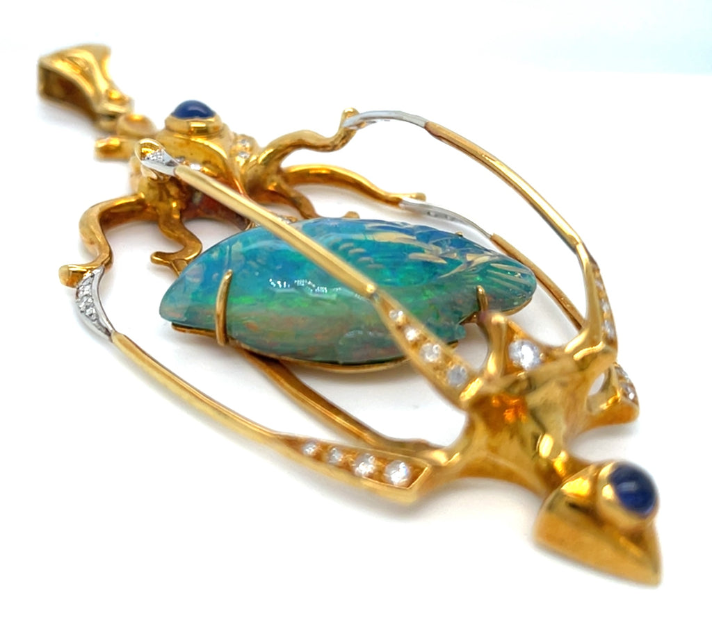 Balogh 18k Yellow Gold & Carved Opal Star Sapphire Caged Bird Pendant w/ Diamond Accents.
