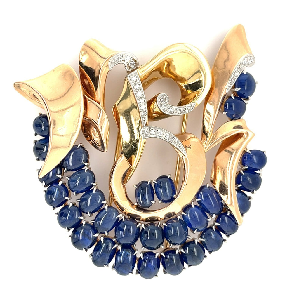 Trabert & Hoeffer Mauboussin Platinum-Topped 14k Gold Brooch w/ Sapphire and Diamonds.