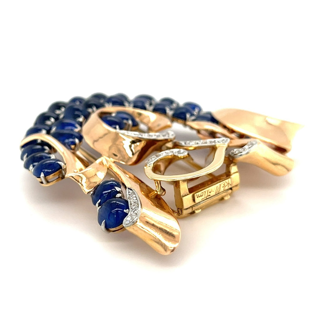 Trabert & Hoeffer Mauboussin Platinum-Topped 14k Gold Brooch w/ Sapphire and Diamonds.