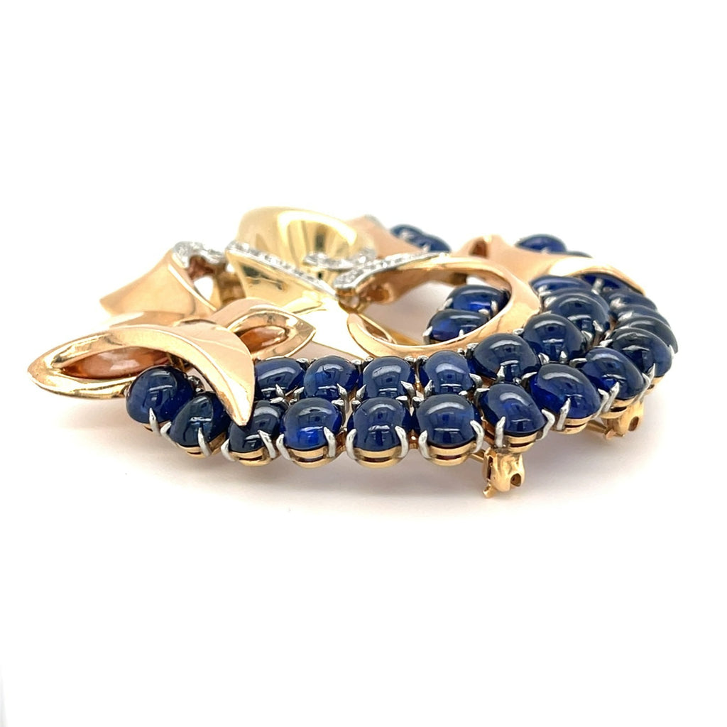 Trabert & Hoeffer Mauboussin Platinum-Topped 14k Gold Brooch w/ Sapphire and Diamonds.