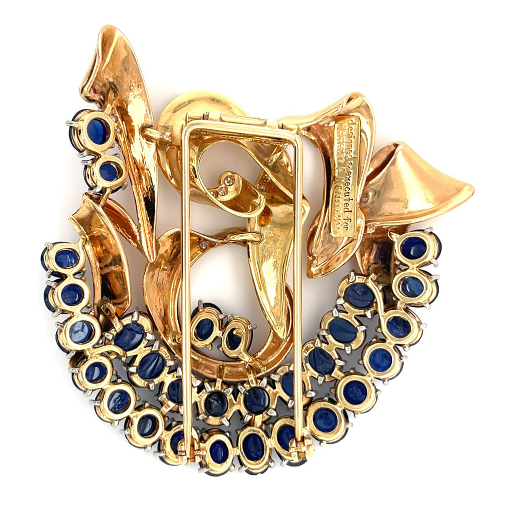 Trabert & Hoeffer Mauboussin Platinum-Topped 14k Gold Brooch w/ Sapphire and Diamonds.