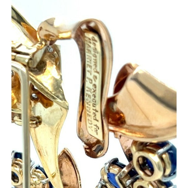 Trabert & Hoeffer Mauboussin Platinum-Topped 14k Gold Brooch w/ Sapphire and Diamonds.