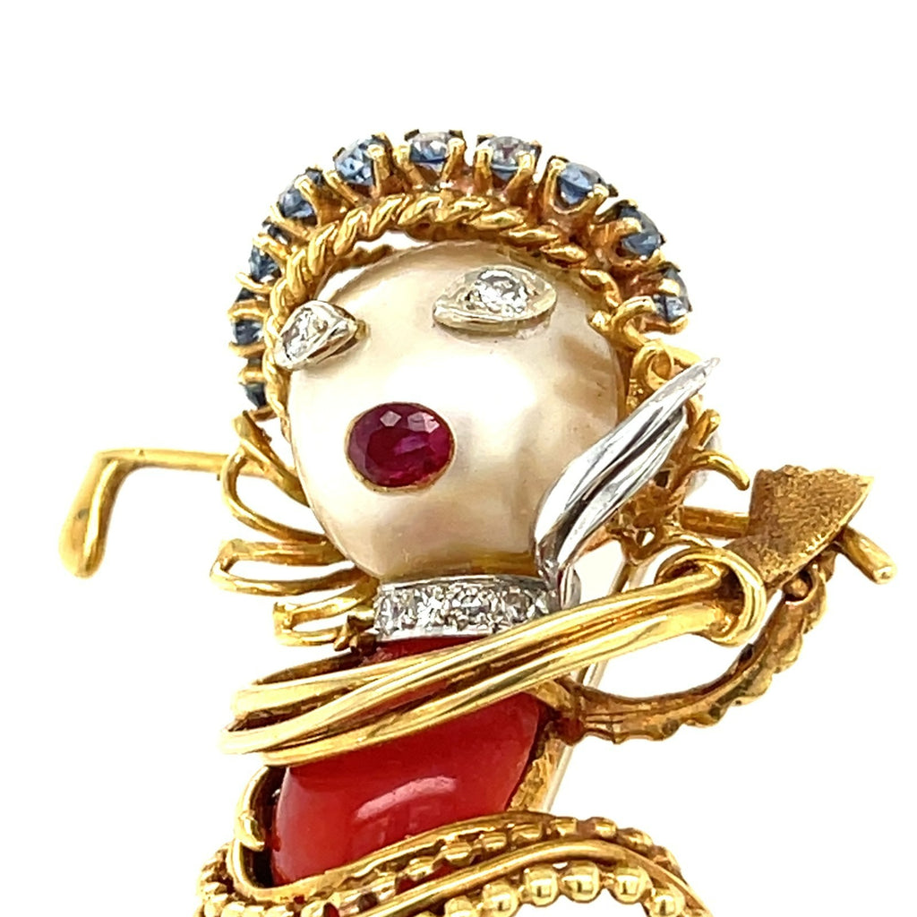 Ian Dessin 18k Gold Coral & Cultured Pearl Golfer Brooch w/ Diamond, Sapphire, Ruby Accents.