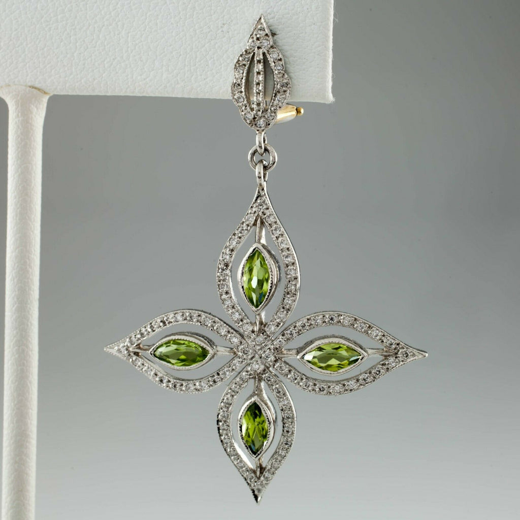 Beautiful Peridot and Diamond Star Dangle Earrings in Platinum TCW = 1.00 cts