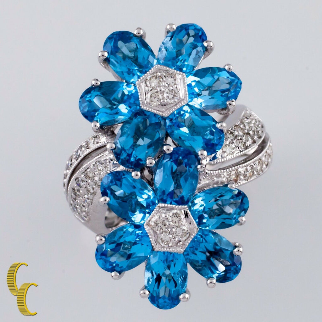 18k White Gold Blue Topaz & Diamond Flower Ring Size: 5