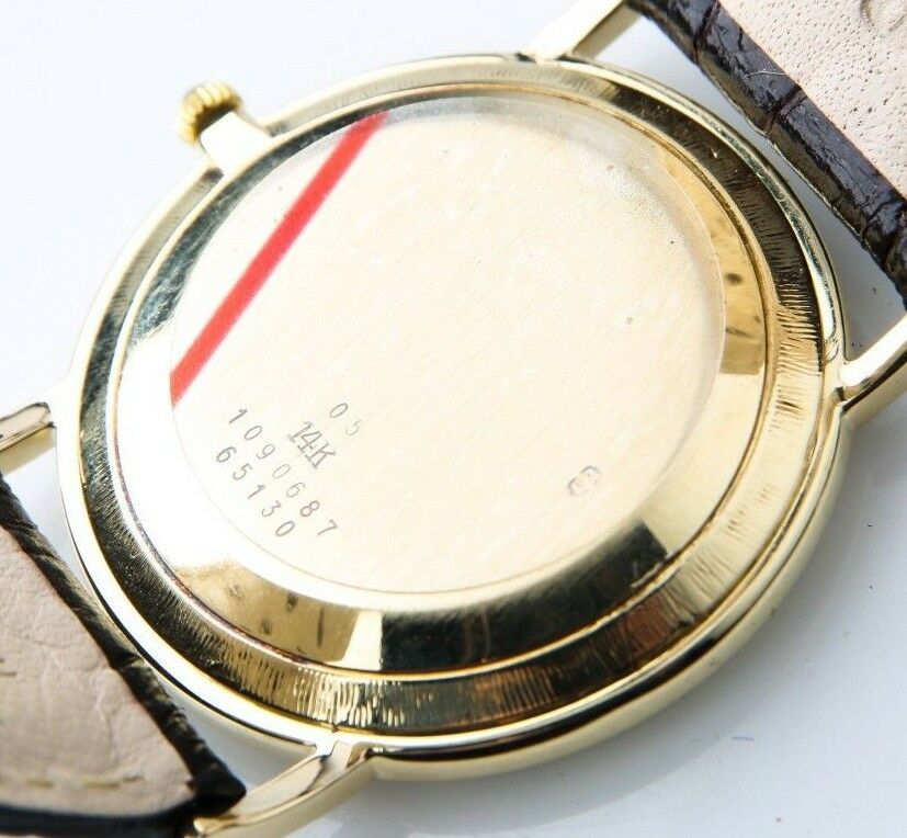 Men's Vintage Φ Baume & Mercier 14k Yellow Gold Quartz Watch Black Leather Band